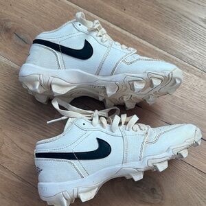 Air Jordan multi sport Cream and Black Cleats